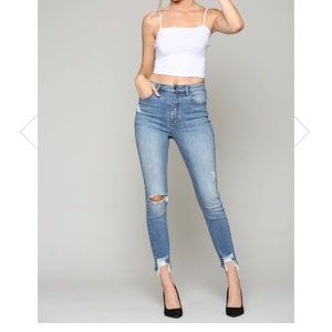 HIGH RISE SKINNY WITH HEM DETAIL